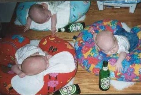 babies with beer bottles